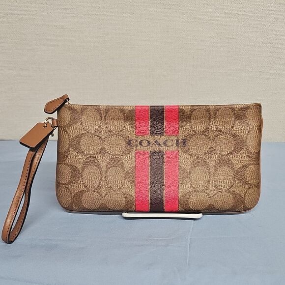COACH VARSITY STRIPE WRISTLET BFPM-07-118 - Picture 1 of 5